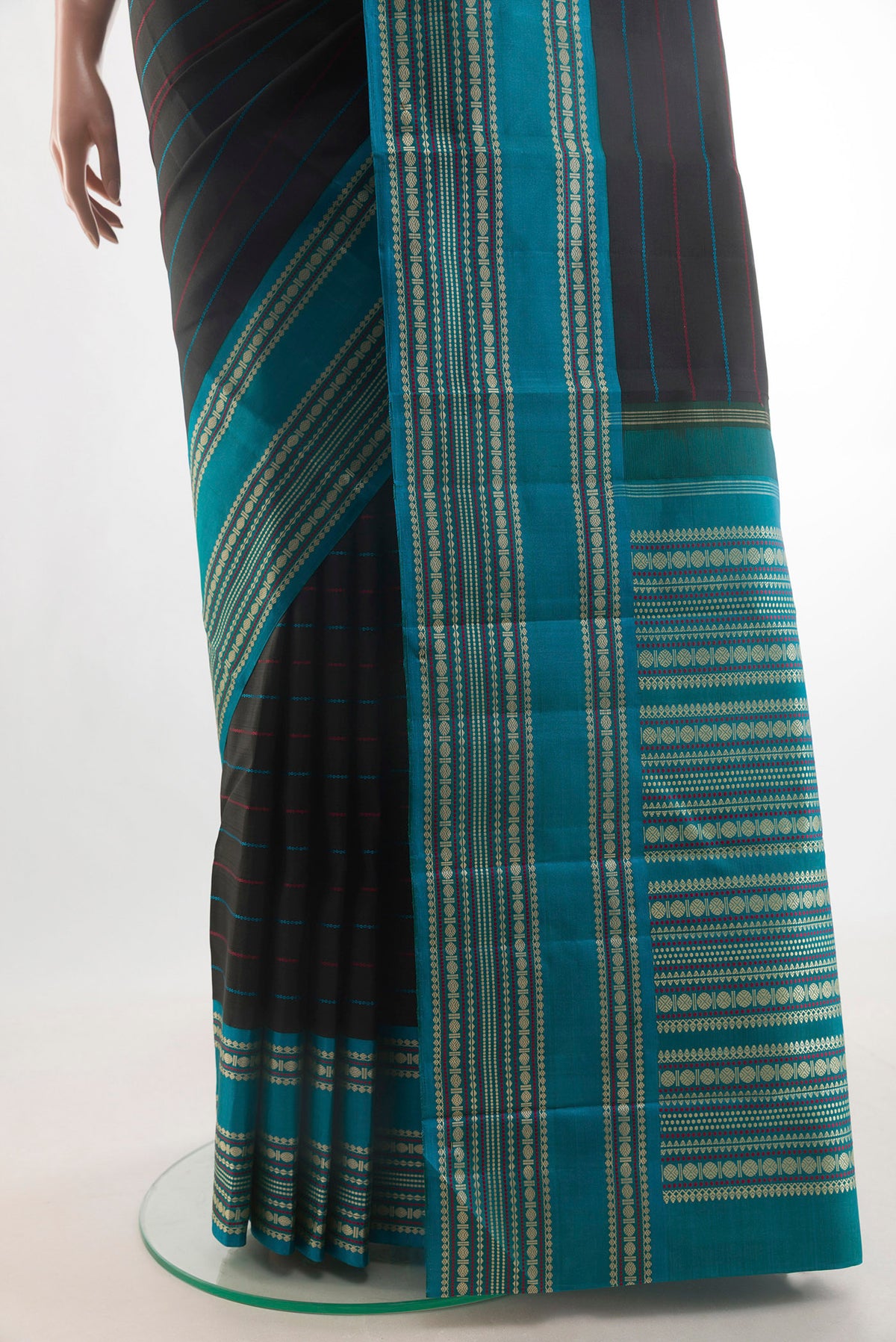 Pleats and pallu of Pure Silk Black Kanjivaram Saree with Stripes on the body and Thread Border. 