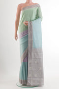 Pure Silk Multi Color Kanjivaram Saree with Checked design on the body and Plain Border.  displayed on a mannequin