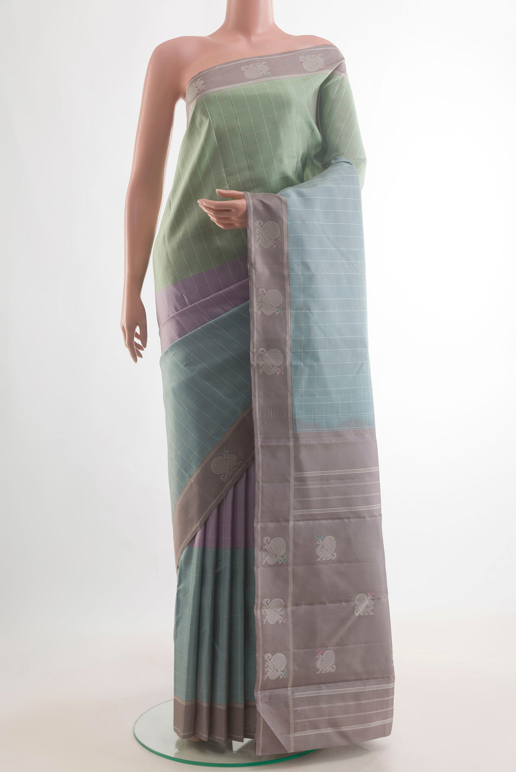 Pure Silk Multi Color Kanjivaram Saree with Checked design on the body and Zari Border.  displayed on a mannequin