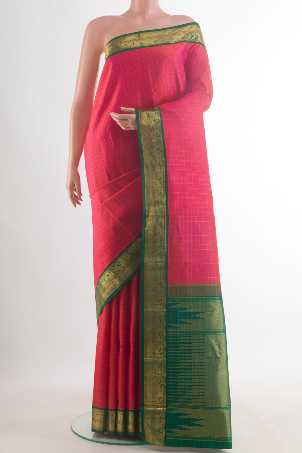 Pure Silk Brick Orange Dual Tone Kanjivaram Saree with Checked design on the body and Zari Border.  displayed on a mannequin