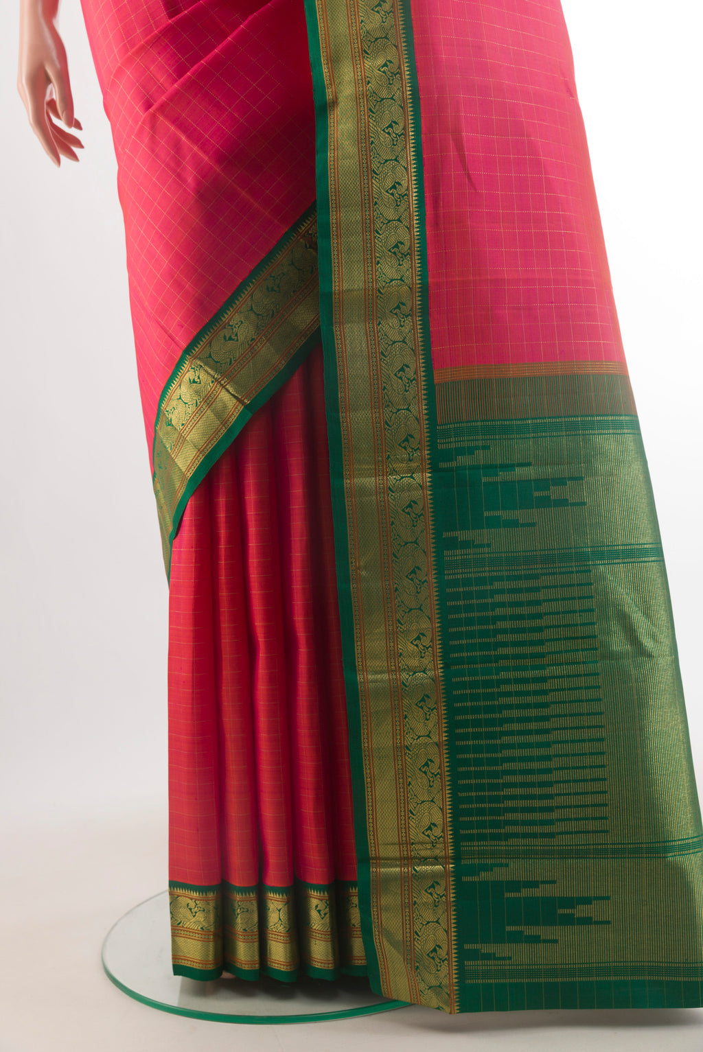 Pleats and pallu of Pure Silk Brick Orange Dual Tone Kanjivaram Saree with Checked design on the body and Zari Border. 