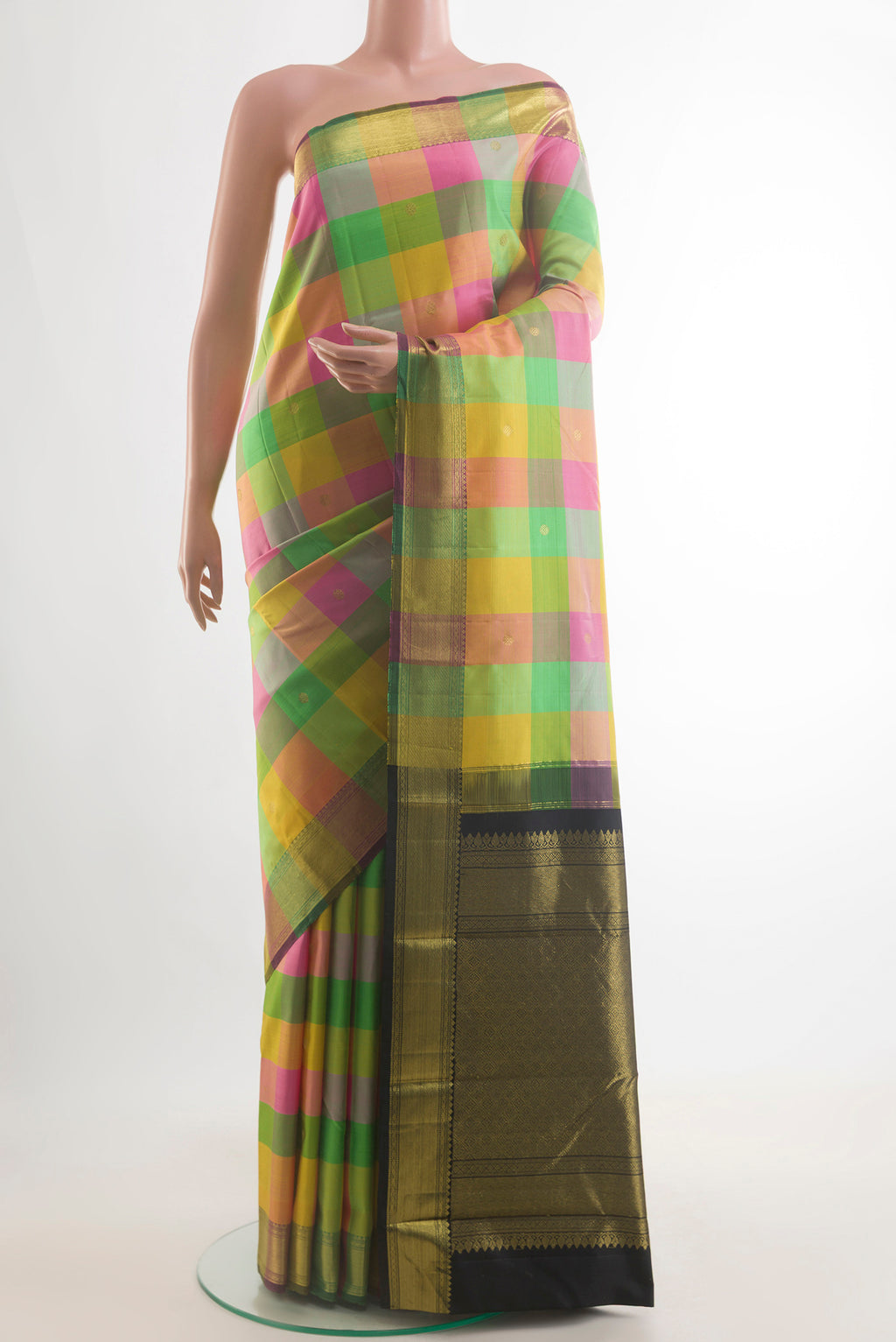 Pure Silk Multi Color Kanjivaram Saree with Checked design on the body and Zari Border.  displayed on a mannequin