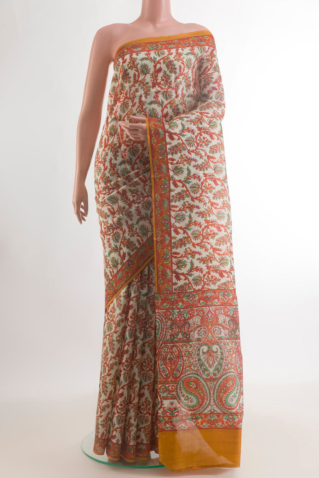 Pure Silk Off White Printed Saree with Printed design on the body and Printed Border.  displayed on a mannequin