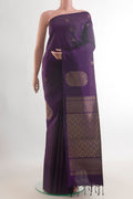 Pure Silk Purple Soft Saree with Zari Butta on the body and Without Border.  displayed on a mannequin