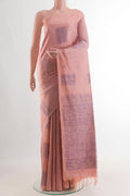 Pure Silk Peach Soft Saree with Thread Butta on the body and Without Border.  displayed on a mannequin