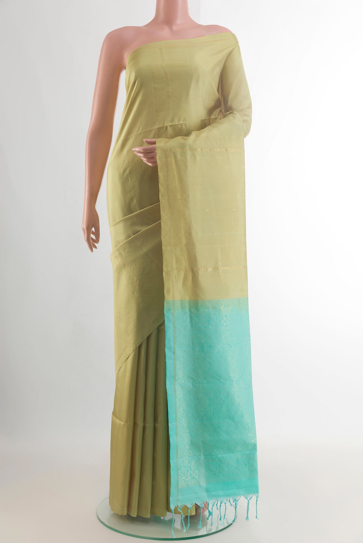 Pure Silk Beige Soft Saree with Stripes on the body and Without Border.  displayed on a mannequin