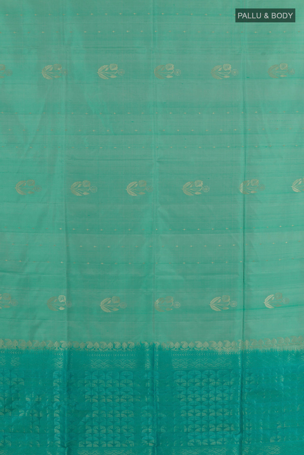 Flat view of Pure Silk Sea Green Soft Saree with Zari Butta on the body and Without Border. 