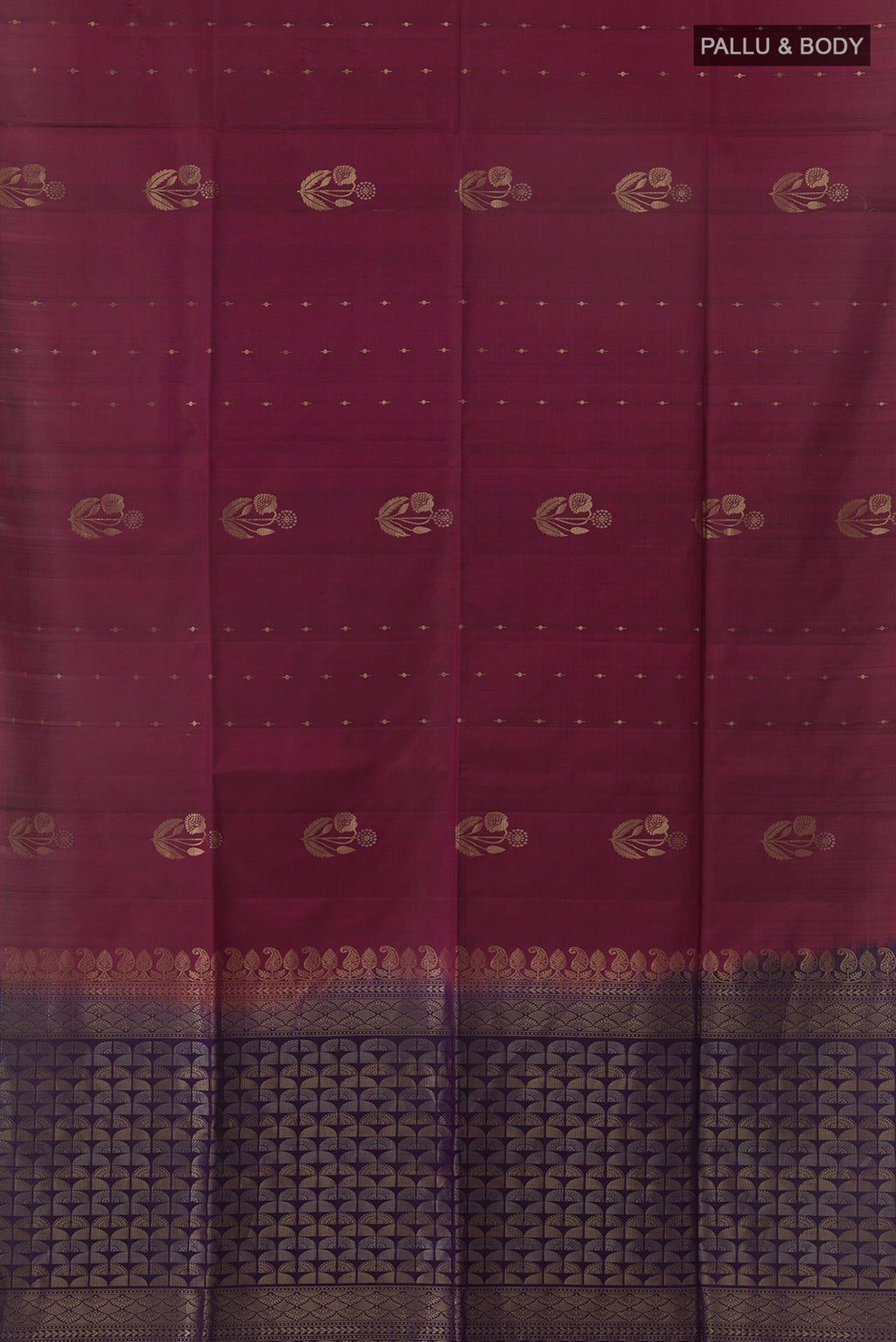 Flat view of Pure Silk Maroon Soft Saree with Zari Butta on the body and Without Border. 