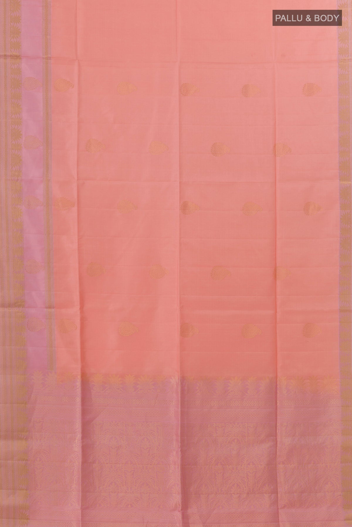 Flat view of Pure Silk Peach Soft Saree with Zari Butta on the body and Zari Border. 