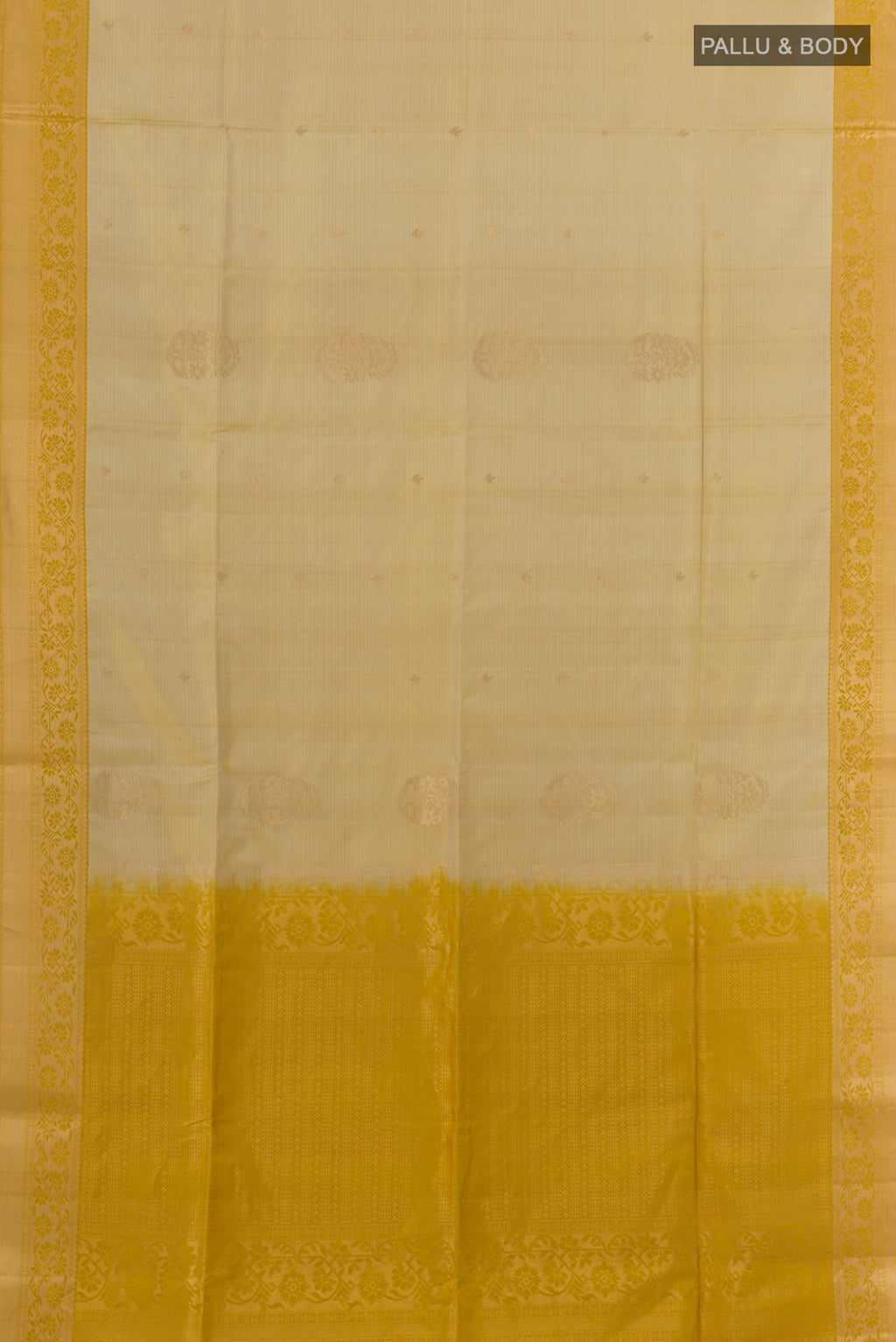 Flat view of Pure Silk Beige Soft Saree with Zari Butta on the body and Zari Border. 