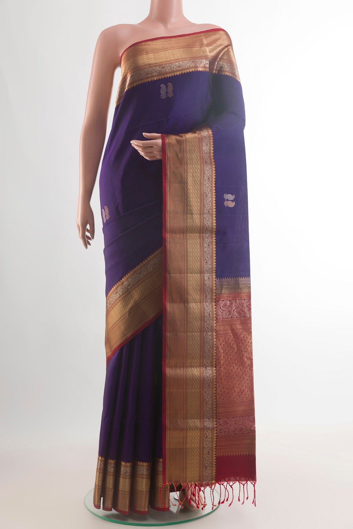 Pure Silk Blue Soft Saree with Zari Butta on the body and Zari Border.  displayed on a mannequin