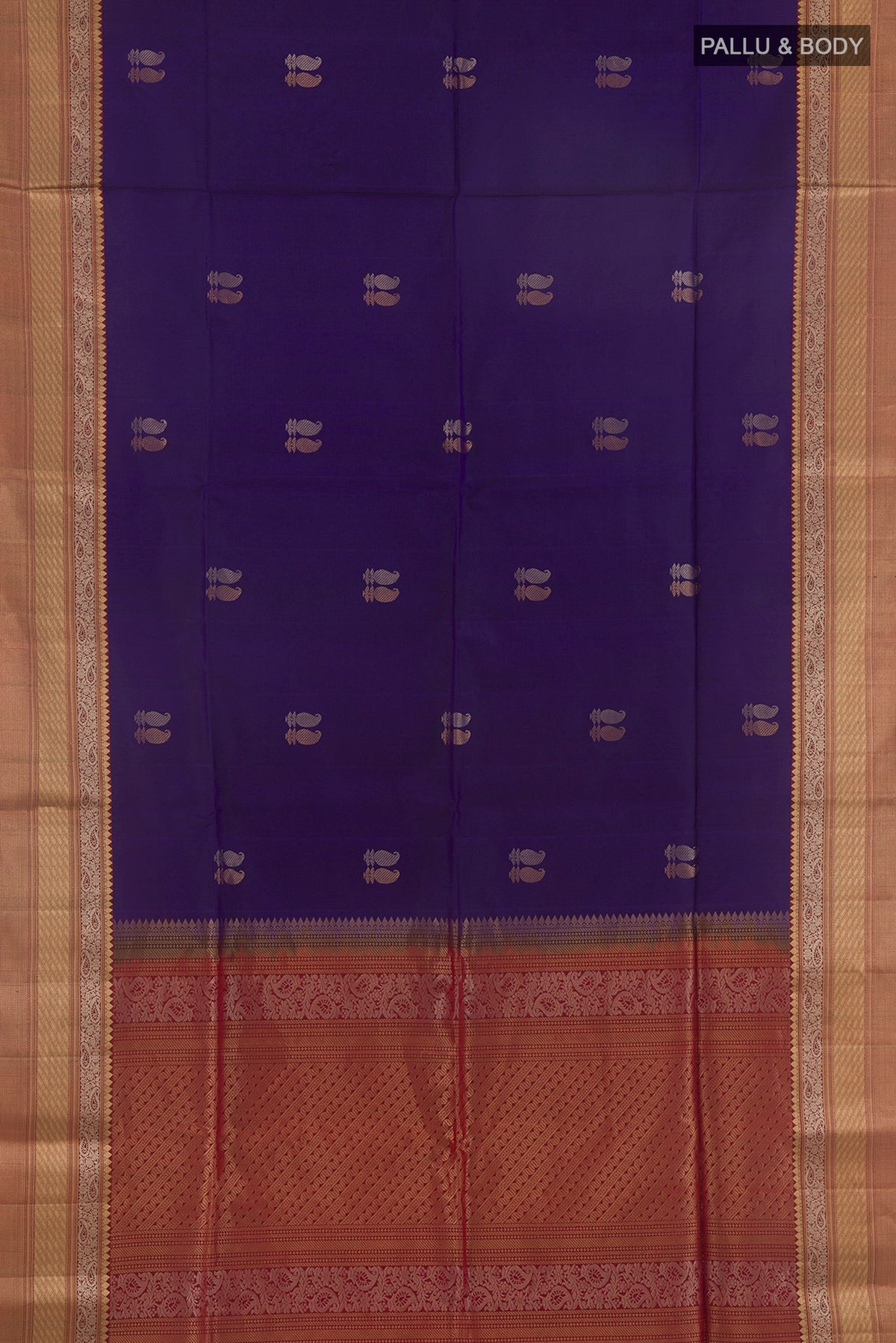 Flat view of Pure Silk Blue Soft Saree with Zari Butta on the body and Zari Border. 