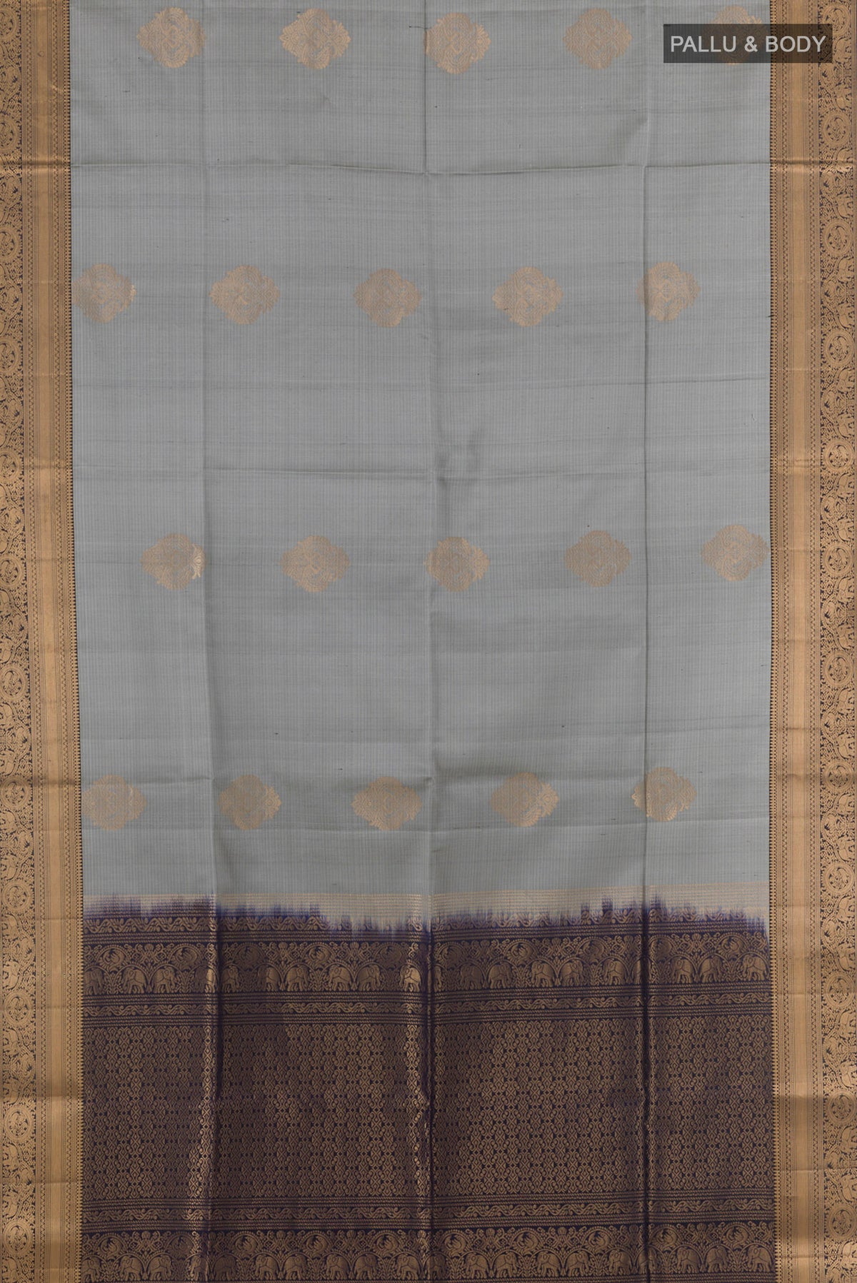 Flat view of Pure Silk Grey Soft Saree with Zari Butta on the body and Zari Border. 