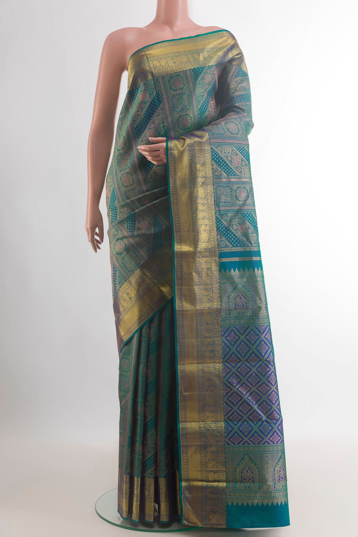 Pure Silk Peacock Blue Dual Tone Kanjivaram Saree with Zari Brocade on the body and Zari Border.  displayed on a mannequin