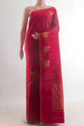 Pure Silk Red Kanchipuram Saree with Plain Body and Zari Border.  displayed on a mannequin