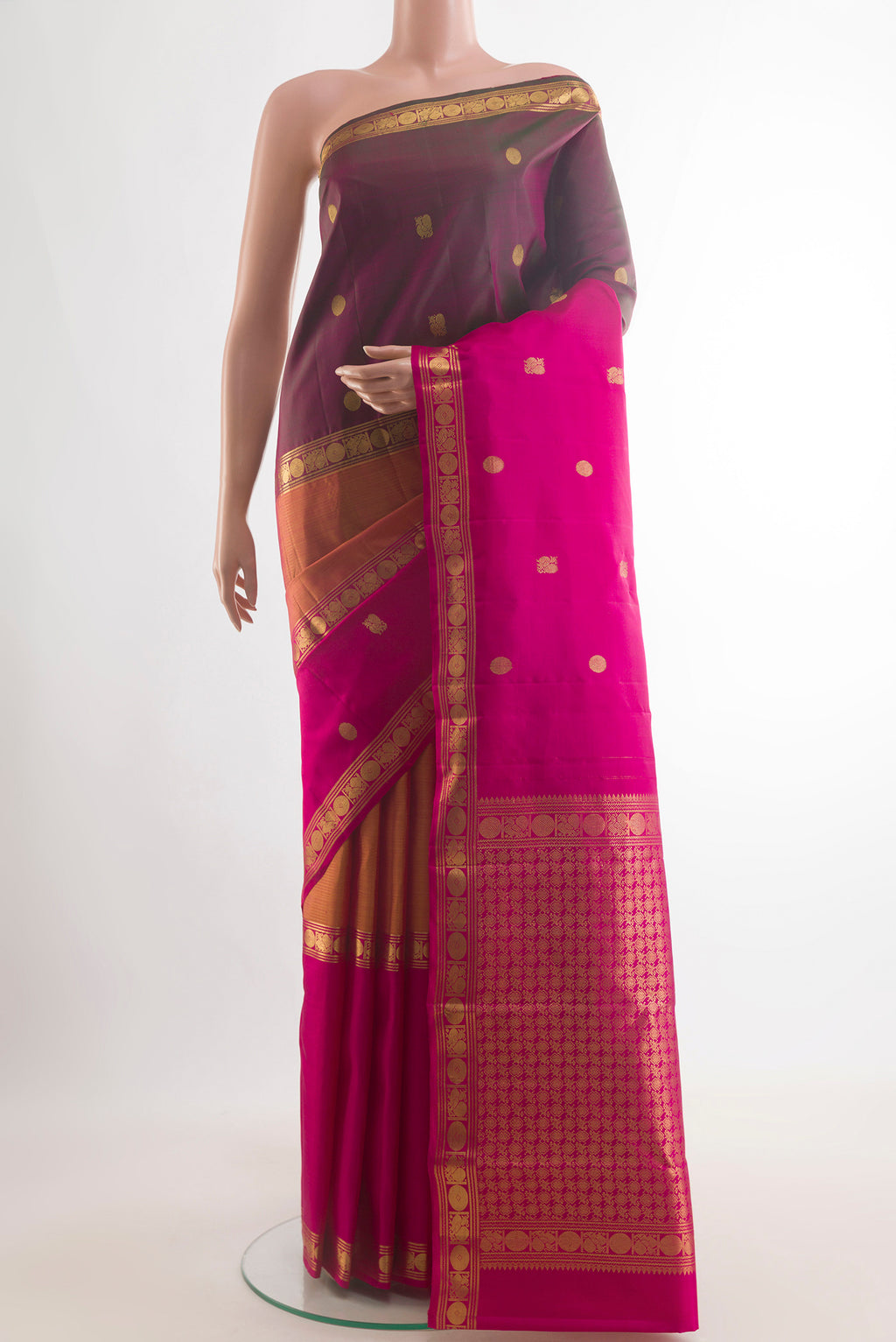 Pure Silk Multi Color Kanjivaram Saree with Zari Butta on the body and Zari Border.  displayed on a mannequin