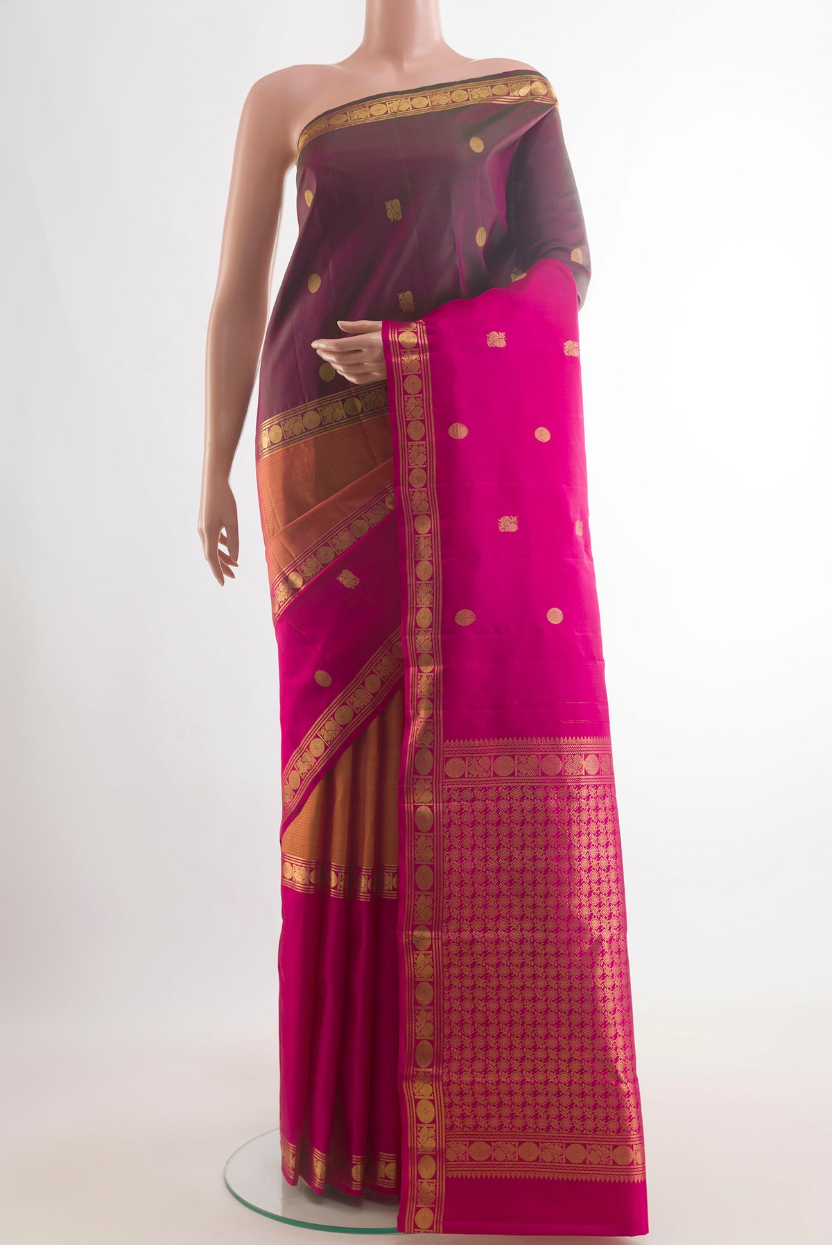 Pure Silk Multi Color Kanjivaram Saree with Zari Butta on the body and Zari Border.  displayed on a mannequin