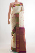 Pure Silk Off White Kanjivaram Saree with Thread Butta on the body and Zari Border.  displayed on a mannequin