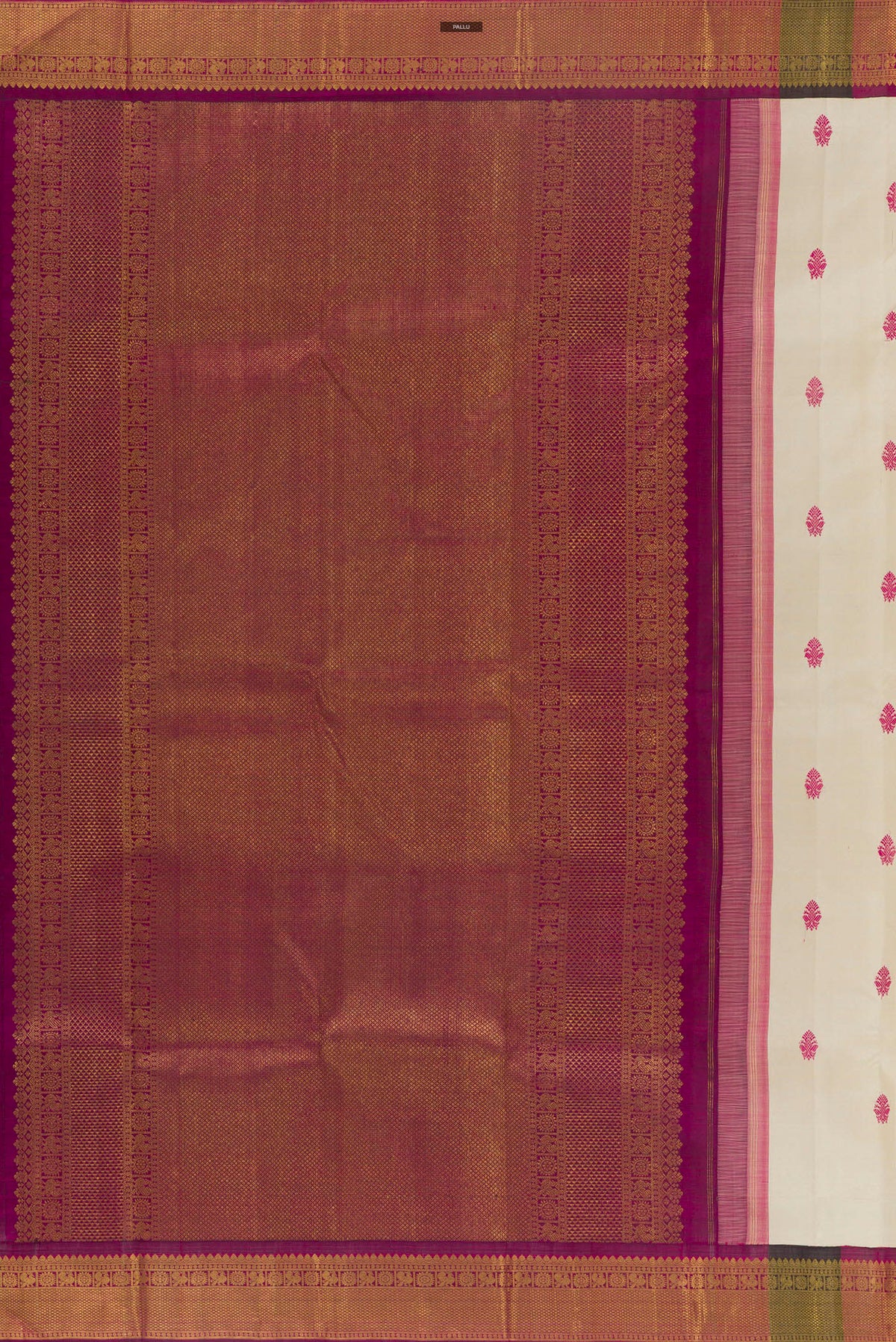 Close up image of the pallu of Pure Silk Off White Kanjivaram Saree with Thread Butta on the body and Zari Border. 