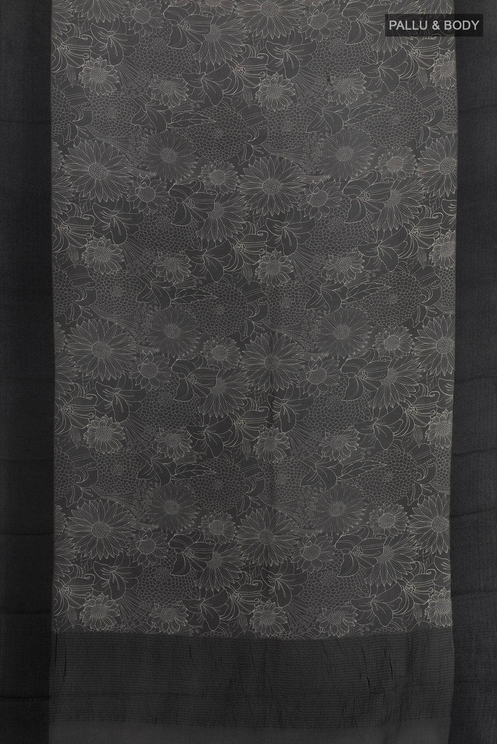 Flat view of Black Tussar Saree with Printed design on the body and Plain Border. 