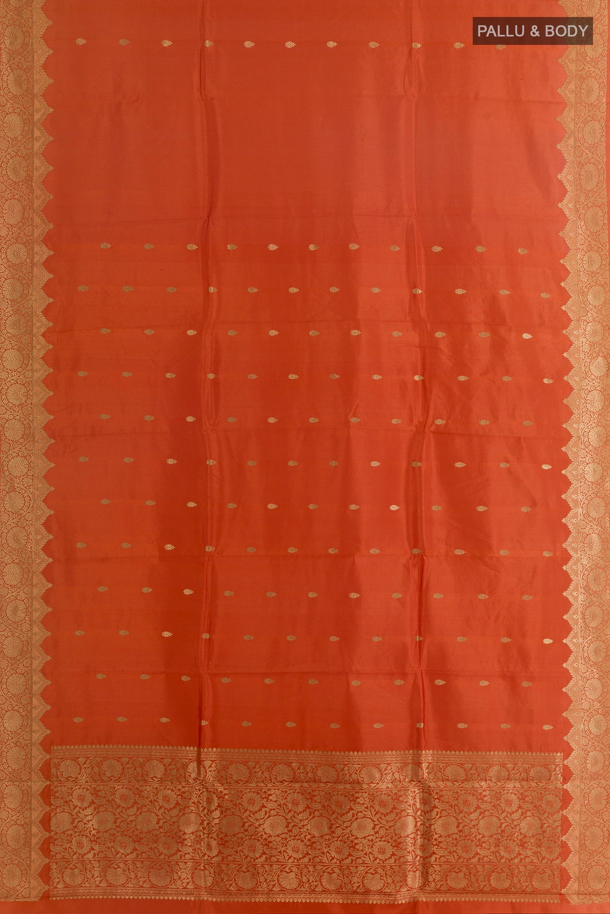 Flat view of Pure Silk Orange Banarasi Katan Saree with Zari Butta on the body and Zari Border. 