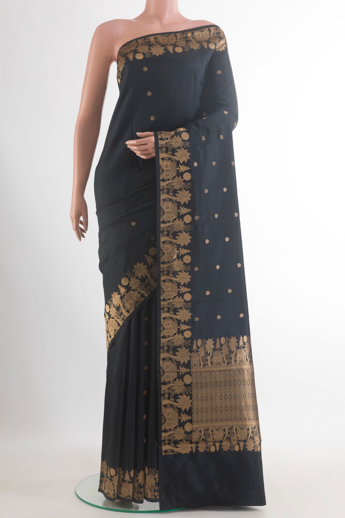 Pure Silk Black Banarasi Katan Saree with Zari Butta on the body and Zari Border.  displayed on a mannequin