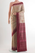 Beige Tussar Saree with Embroidery on the body and Plain Border.  displayed on a mannequin