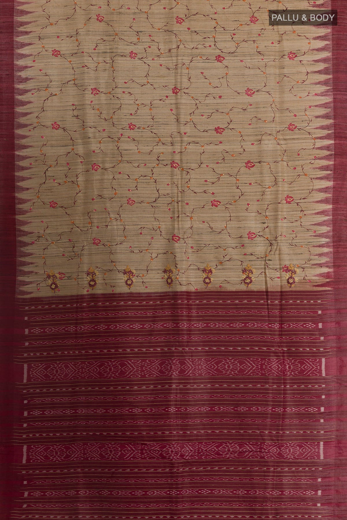 Flat view of Beige Tussar Saree with Embroidery on the body and Plain Border. 