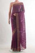 Burgundy Tussar Saree with Embroidered on the body and Zari Border.  displayed on a mannequin
