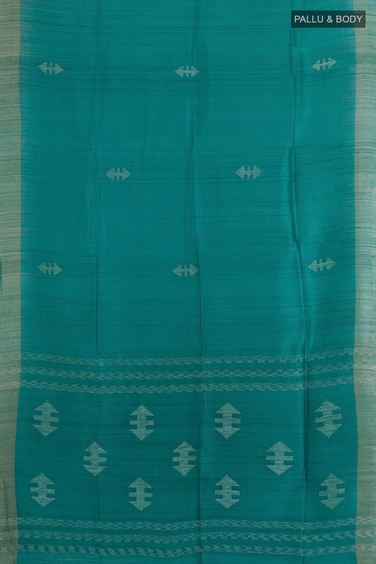 Flat view of Sea Green Tussar Saree with Thread Butta on the body and Zari Border. 