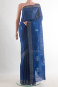 Blue Tussar Saree with Embroidered on the body and Zari Border.  displayed on a mannequin