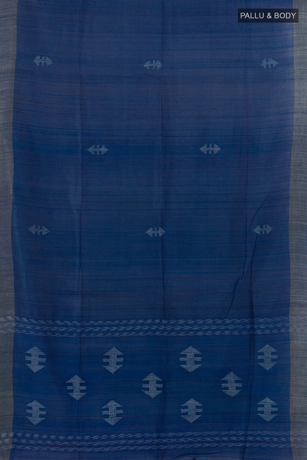 Flat view of Blue Tussar Saree with Embroidered on the body and Zari Border. 