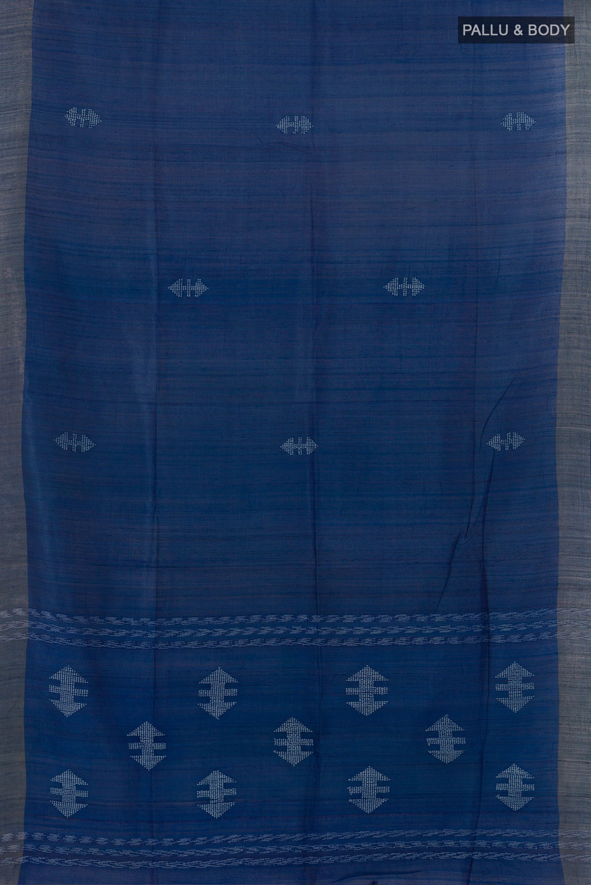 Flat view of Blue Tussar Saree with Embroidered on the body and Zari Border. 