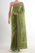 Green Tussar Saree with Embroidered on the body and Zari Border.  displayed on a mannequin