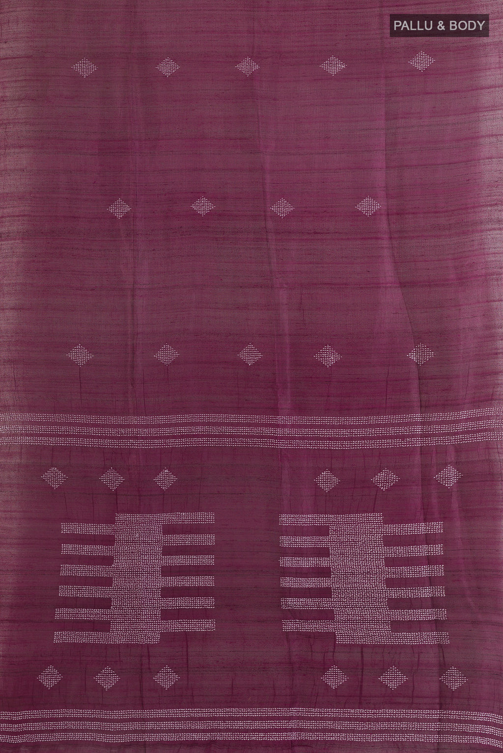 Flat view of Burgundy Tussar Saree with Thread Butta on the body and Zari Border. 