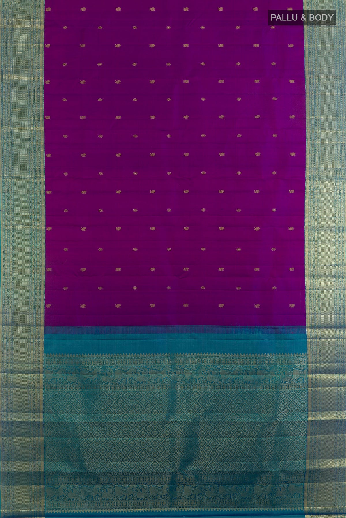 Flat view of Pure Silk Purple Kanchipuram Saree with Zari Butta on the body and Zari Border. 