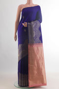 Pure Silk Pure Zari Blue Kanjivaram Saree with Zari Butta on the body and Zari Border.  displayed on a mannequin
