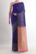 Pure Silk Dark Blue Kanjivaram Saree with Zari Butta on the body and Zari Border.  displayed on a mannequin
