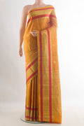 Pure Silk Yellow Kanchipuram Saree with Zari Butta on the body and Zari Border.  displayed on a mannequin