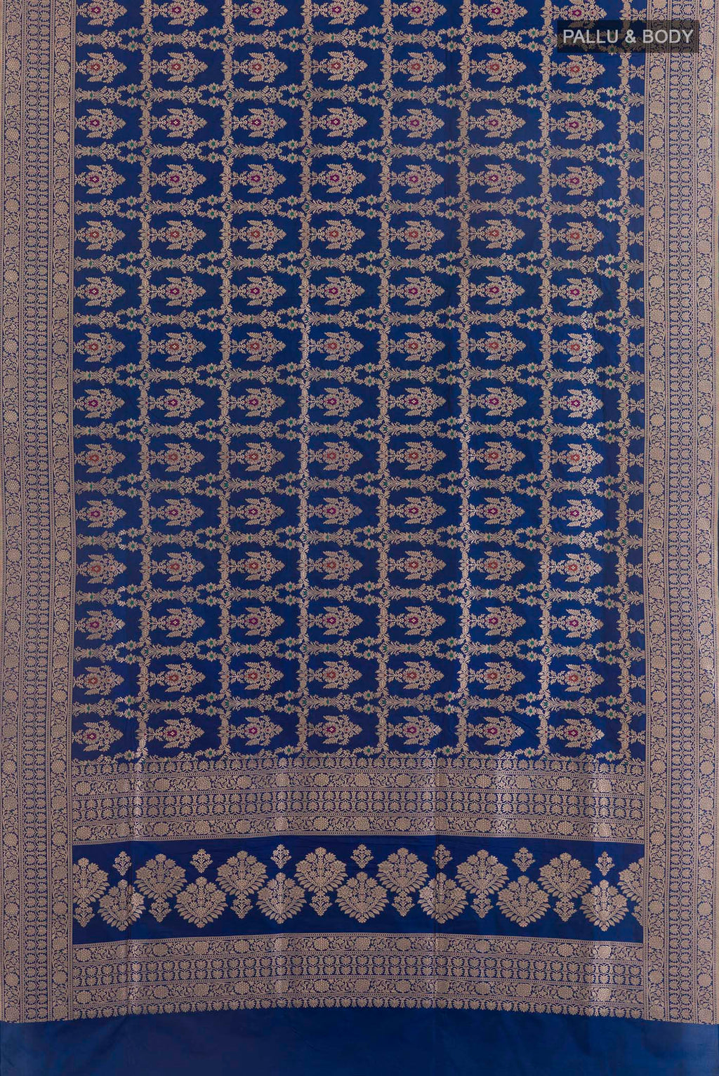 Flat view of Pure Silk Blue Banarasi Saree with Zari Brocade on the body and Zari Border. 