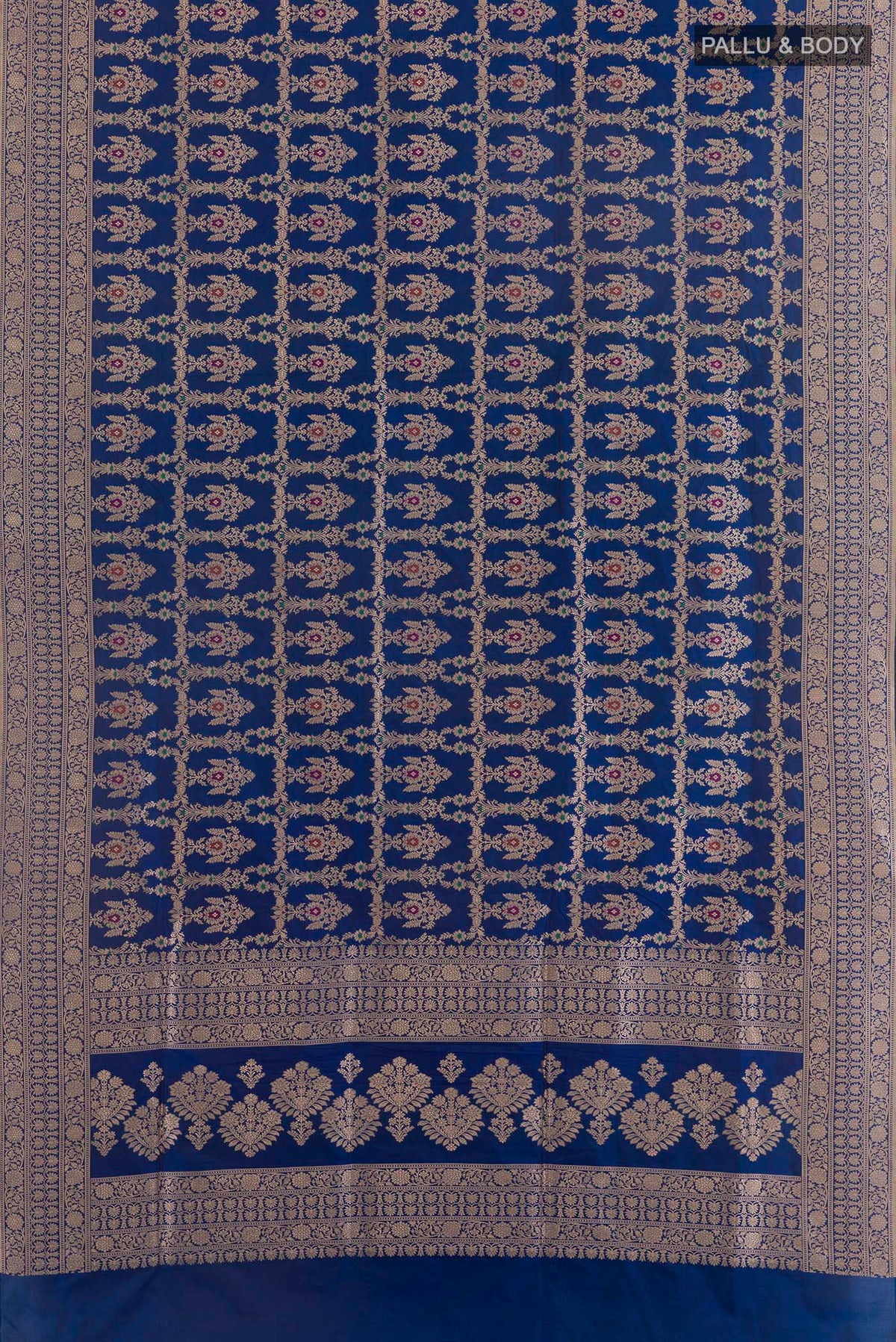 Flat view of Pure Silk Blue Banarasi Saree with Zari Brocade on the body and Zari Border. 
