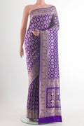 Pure Silk Purple Banarasi Saree with Zari Brocade on the body and Zari Border.  displayed on a mannequin