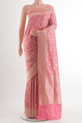 Pure Silk Peach Banarasi Saree with Zari Brocade on the body and Zari Border.  displayed on a mannequin