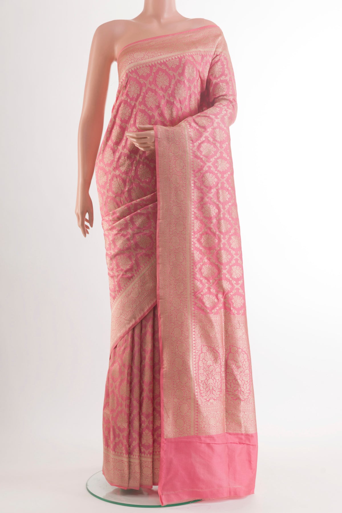 Pure Silk Peach Banarasi Saree with Zari Brocade on the body and Zari Border.  displayed on a mannequin