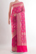 Pure Silk Pink Banarasi Saree with Zari Brocade on the body and Zari Border.  displayed on a mannequin