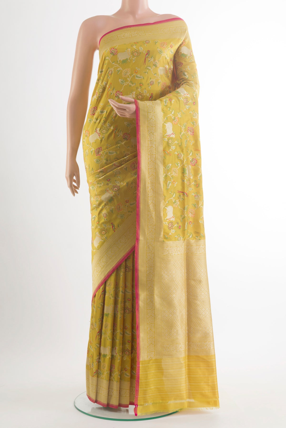 Pure Silk Yellow Banarasi Saree with Zari And Thread Butta on the body and Zari Border.  displayed on a mannequin
