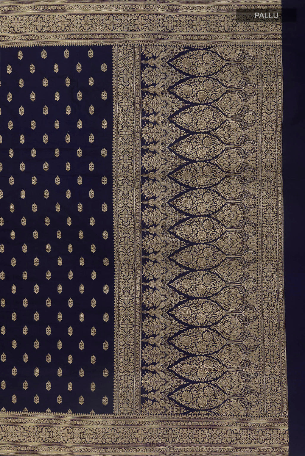 Close up image of the pallu of Navy Blue Banarasi Saree with Zari Butta on the body and Zari Border. 