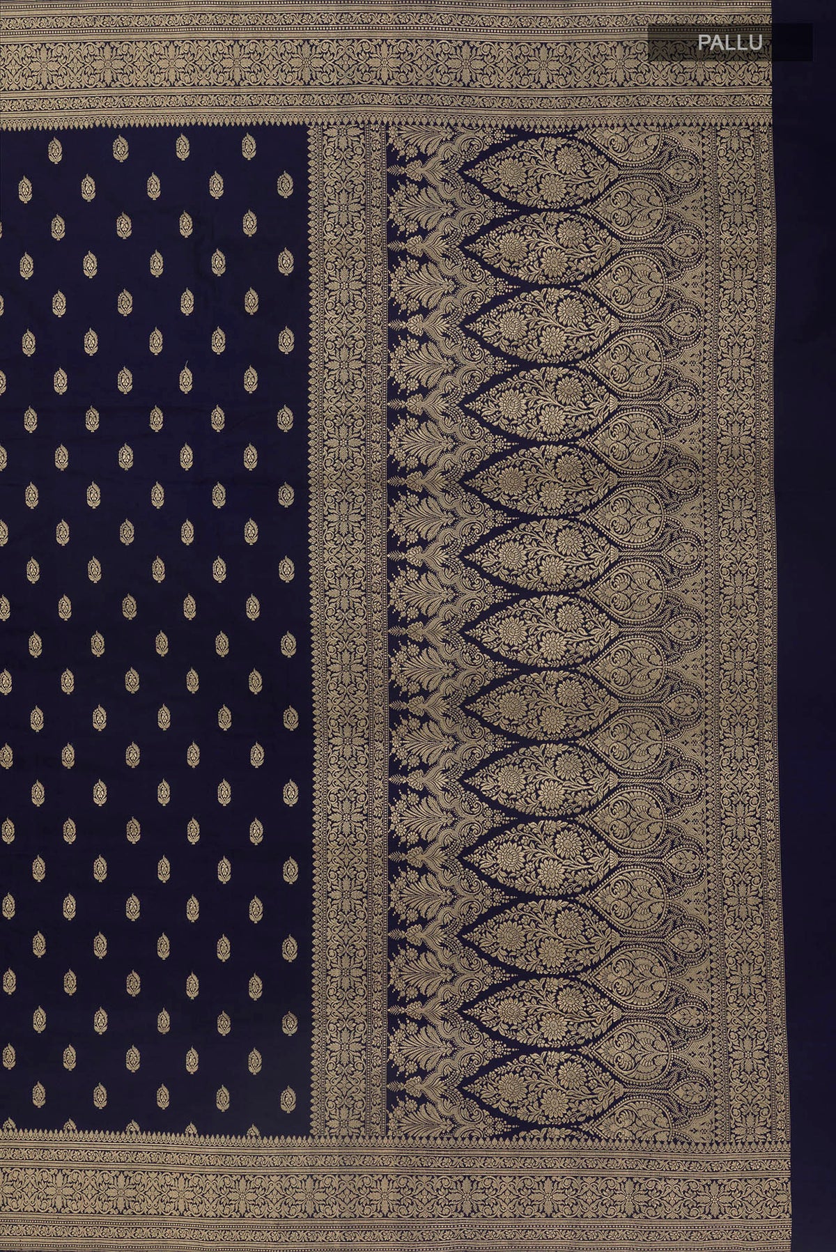 Close up image of the pallu of Navy Blue Banarasi Saree with Zari Butta on the body and Zari Border. 