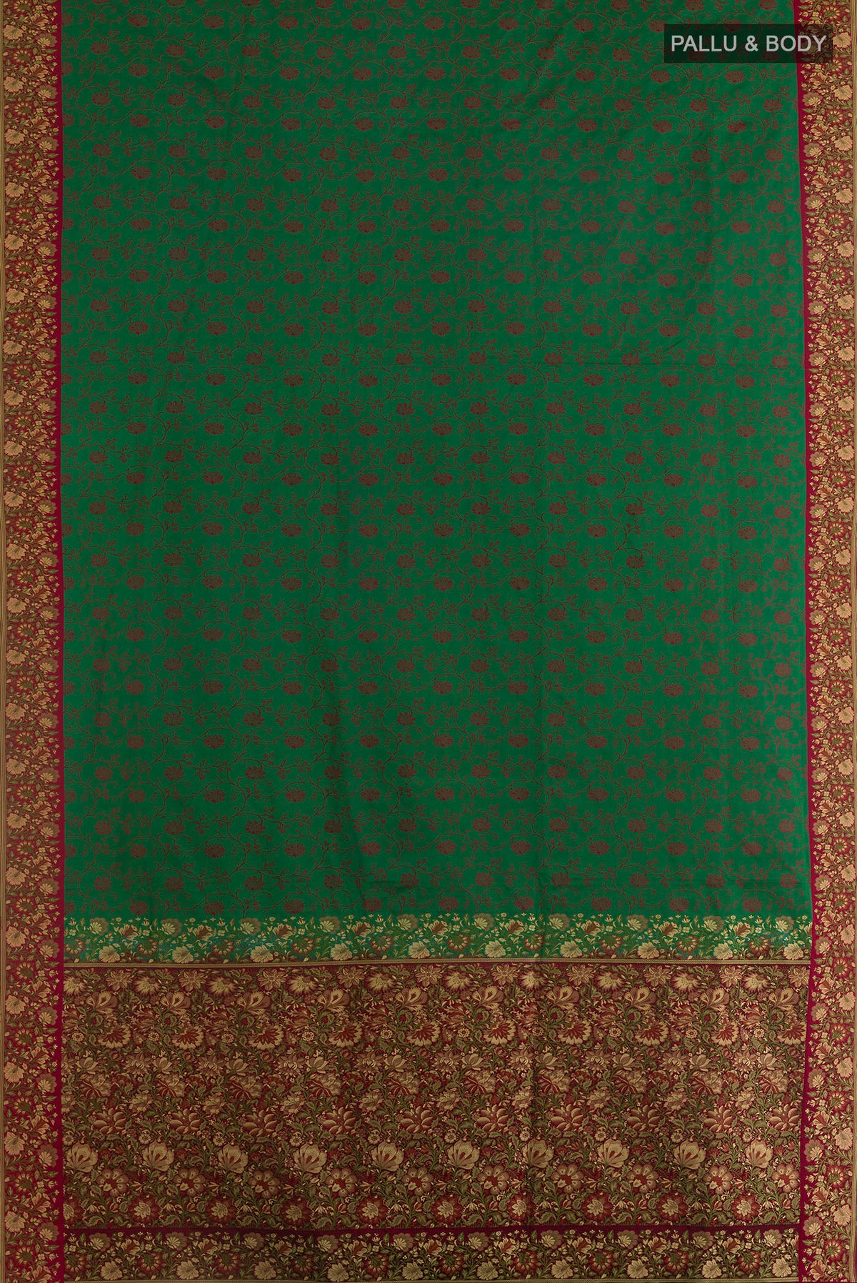 Flat view of Green Banarasi Tanchoi Saree with Jacquard design on the body and Embroidery Border. 
