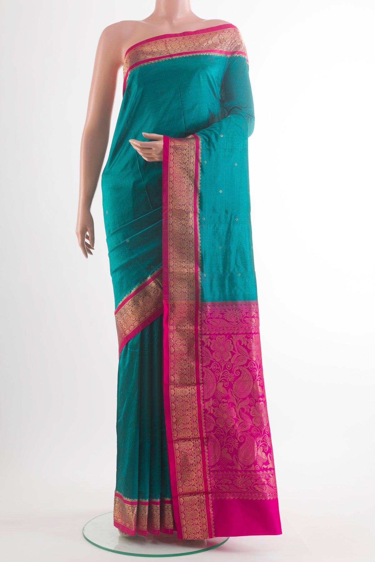 Pure Silk Blue Bangalore Saree with Zari Butta on the body and Zari Border.  displayed on a mannequin